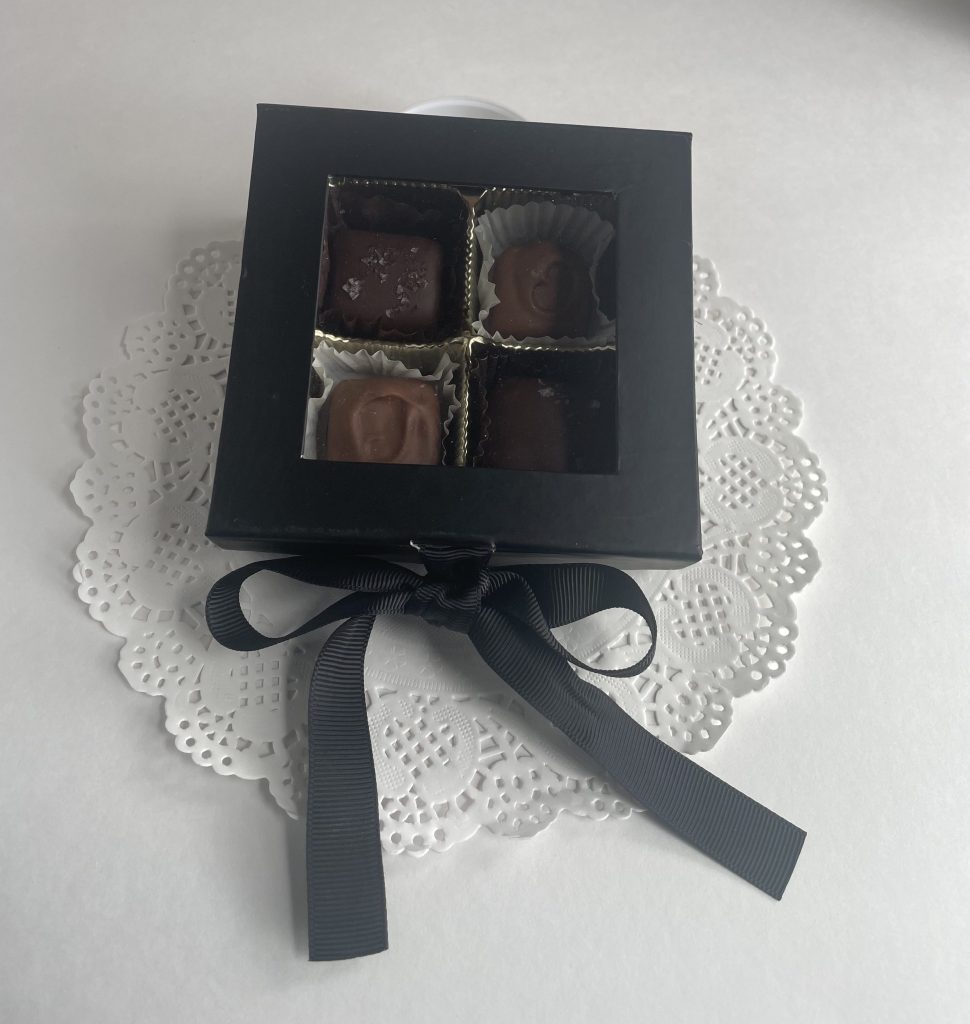 black square box with black ribbon